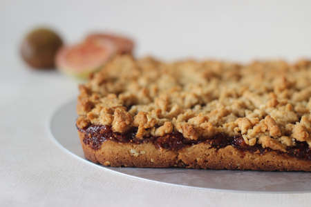Home-baked fig crumbles taken out of bake dish. Shot on white background.の写真素材