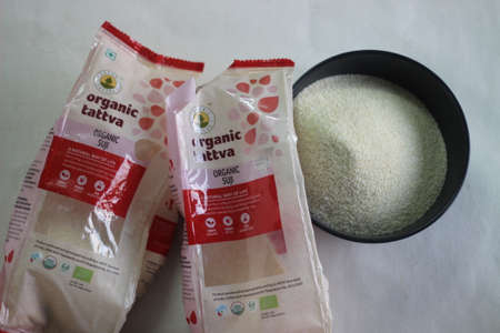 Mumbai, Maharashtra, India, March 07 2021: Granulated wheat or otherwise known as semolina in a red...