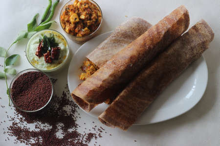 Crispy pancake made of fermented whole grain finger millet batter. Served with cottage cheese gravy...