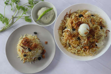 Home made chicken biriyani served with gooseberry pickle. Steamed basmati rice layered with yogurt...