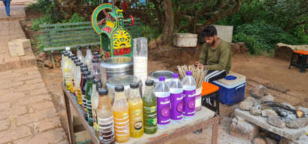 Mahabaleshwar, Maharashtra, India, December 20 2021: Juice vendor at Elphinstone Point,...