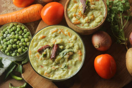 A tasty vegetarian side dish made with a choice of vegetables in a ground coconut cashew based gravy with a nice fennel seed flavour along with other spices. Locally known as vegetable kurma in Indiaの写真素材