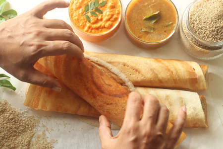Crispy crepes made of little millets and lentils. Commonly known as little millet dosa. Plated as...