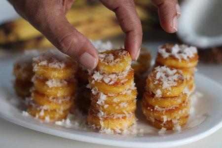 Ghee roasted ripe plantain slices, dipped in coconut sugar mixture. A special evening snack from...