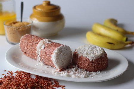 Navara rice puttu, steamed rice cake made with navara rice grains and grated coconutの写真素材