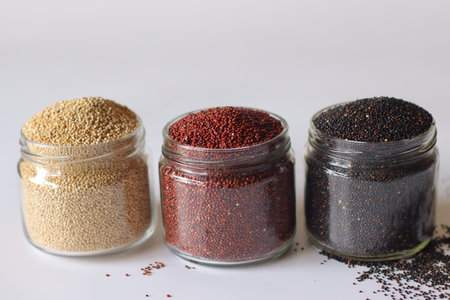 White, Black and Red Quinoa in Glass Jars