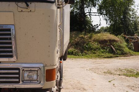 cabin beigeTruck in the village