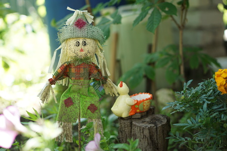 Stuffed scarecrow on a traditional fence in northern Swedenの写真素材
