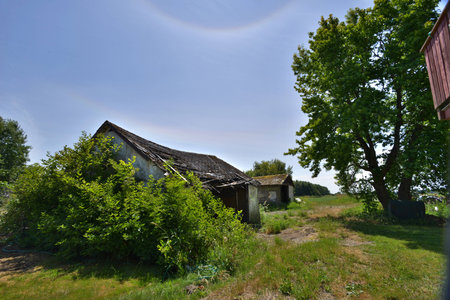 abandoned garage with warped roofの写真素材