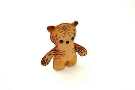 a cute custom handcrafted stuffed leather toy kittyの写真素材