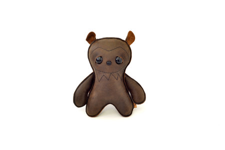 a cute custom handcrafted stuffed leather toy bearの写真素材