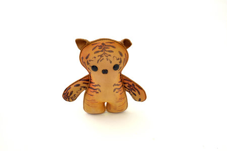 a cute custom handcrafted stuffed leather toy kittyの写真素材