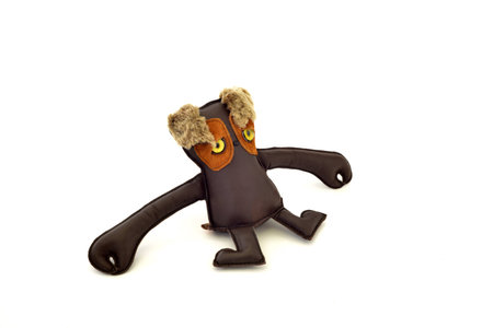 a cute custom handcrafted stuffed leather toy long armed freakの写真素材