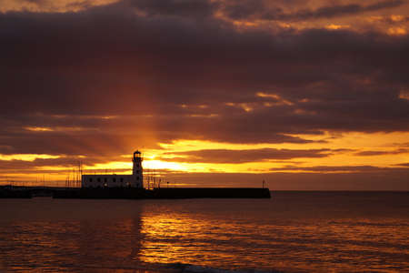 Sunrise and Lighthouseの写真素材