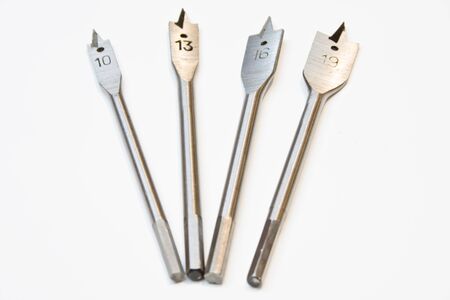 Selection of wood drills over a white backgroundの写真素材