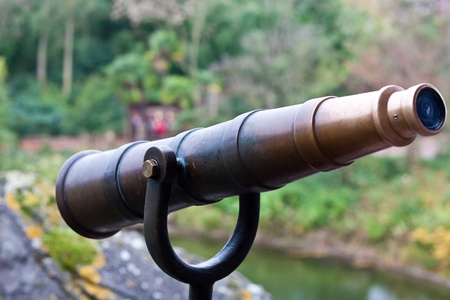 A weathered telescope on a stand