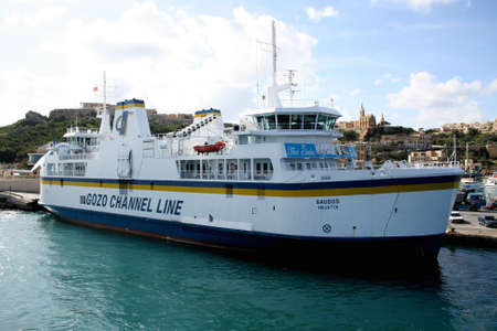 Ferry in Gozo main harbour of Ghajnsielem, Gozo, Maltaのeditorial素材