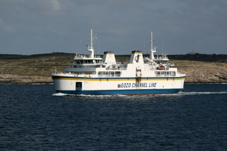 Ferry nears Gozo main harbour of Ghajnsielem, Gozo, Maltaのeditorial素材