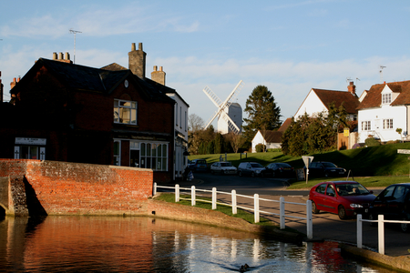 Windmill, houses and pond, Finchingfield, Essex, England