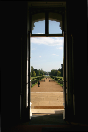 View from inside of Wrest House looking towards Archer Pavillion through the French Garden, Wrest Park, near Silsoe, Bedfordshire, Englandのeditorial素材