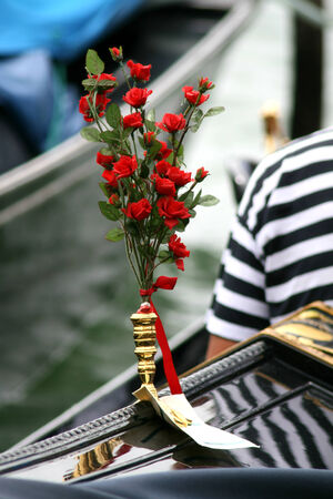 Rose decoration on bow of gondola, Venice, Italyの写真素材