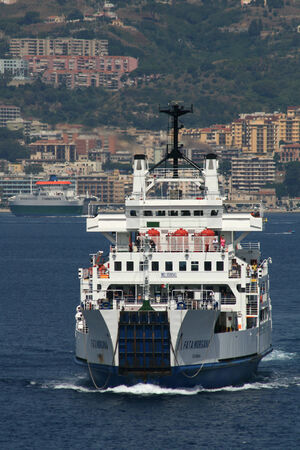 Ferry crosses the Messina Strait from Sicily to the mainland of Italyのeditorial素材