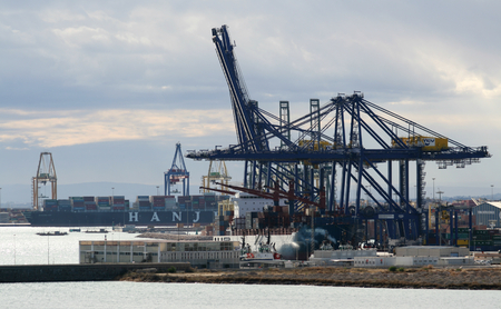 Container depot and cranes at the Port of Valencia, Spainの写真素材