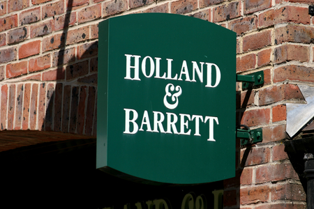 Holland  Barrett health food shop sign Grove Shopping Centre Witham Essex Englandのeditorial素材