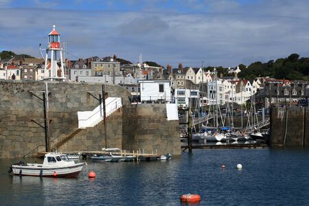 Harbour and town of St Peter Port on Guernsey in the Channel Islandsのeditorial素材