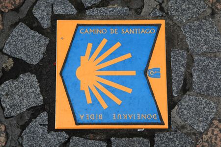 Tile in path to guide pilgrims travelling to Santiago de Compostela seen in Bilbao Spainのeditorial素材
