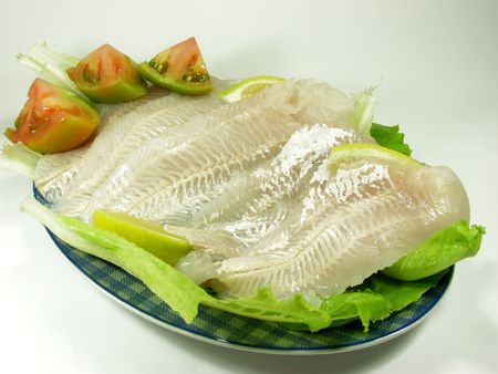 Cuting fish fillet for sushi
