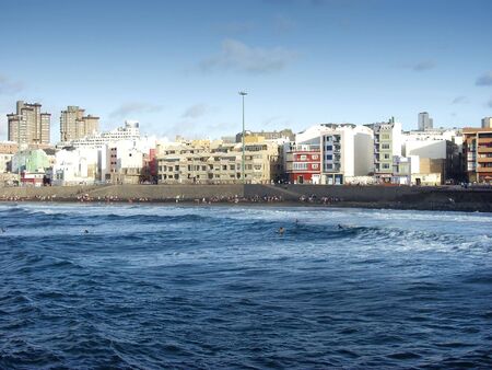 surfer on the sea near the beachの写真素材