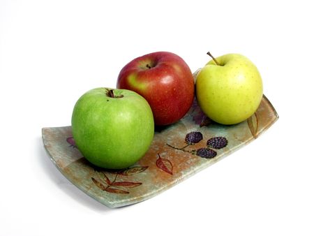 decorated tray with red, geen and yellow apples.の写真素材