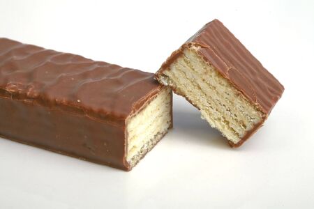 chocolate wafer cutted on white background