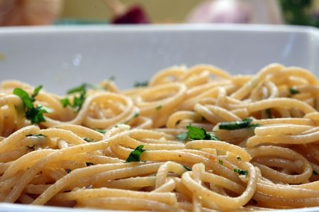 Plate of spaghetti with tomato sauce and a parsleyの写真素材