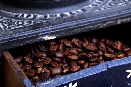 old coffee mill with Beans inside the wooden boxの写真素材