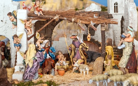 Nativity scene from figurine crib with focus on Mary and baby Jesus.の写真素材