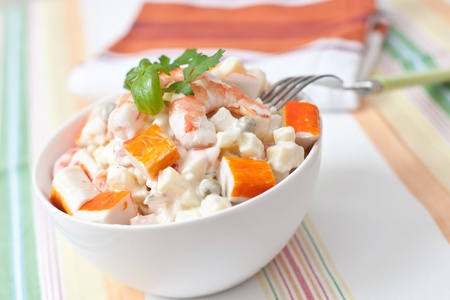 surimi and prawn salad with potato and sauceの写真素材