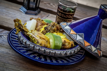 moroccan food chicken tajine with vegetables and teaの写真素材