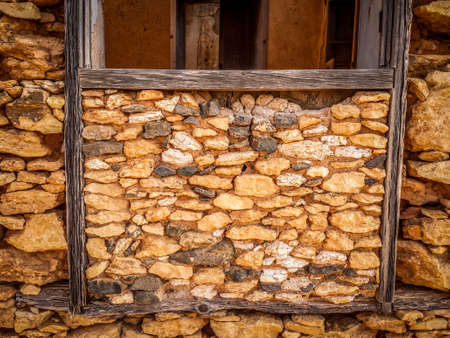 The old wooden door in an abandoned house