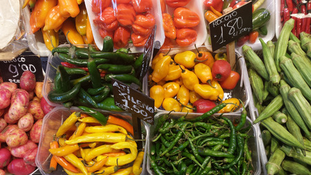 different types of chilli peppers on mexican market.