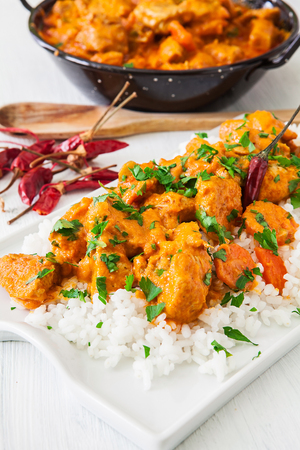 Curried Coconut Chicken with red hot chili pepper and riceの写真素材