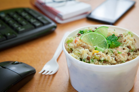 Healthy Vegetable Lunch Box On Working Deskの写真素材