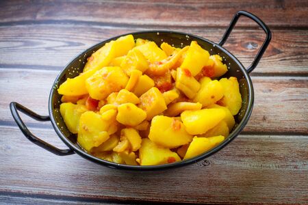 fresh stew potato and squid on sauceの写真素材