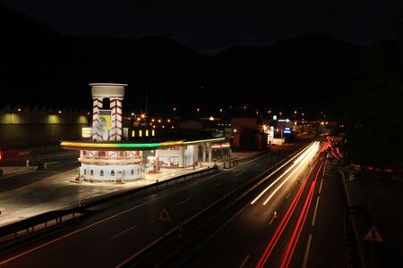 Traffic lights next to gas stationの写真素材