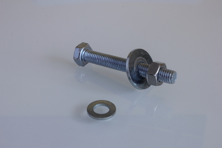 Screw, nut and washer on white backgroundの写真素材