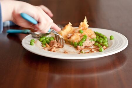 child eating a mealの写真素材