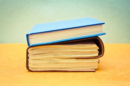 Two books in pastel tones as a still life imageの写真素材