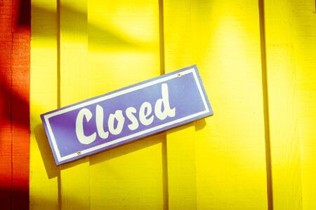 Colrful closed sign on a doorway in a tropical placeの写真素材