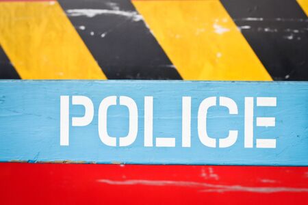 Close up of a police sign in bright colorsの写真素材